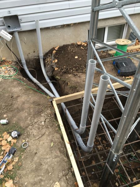 Tower base and conduit installation